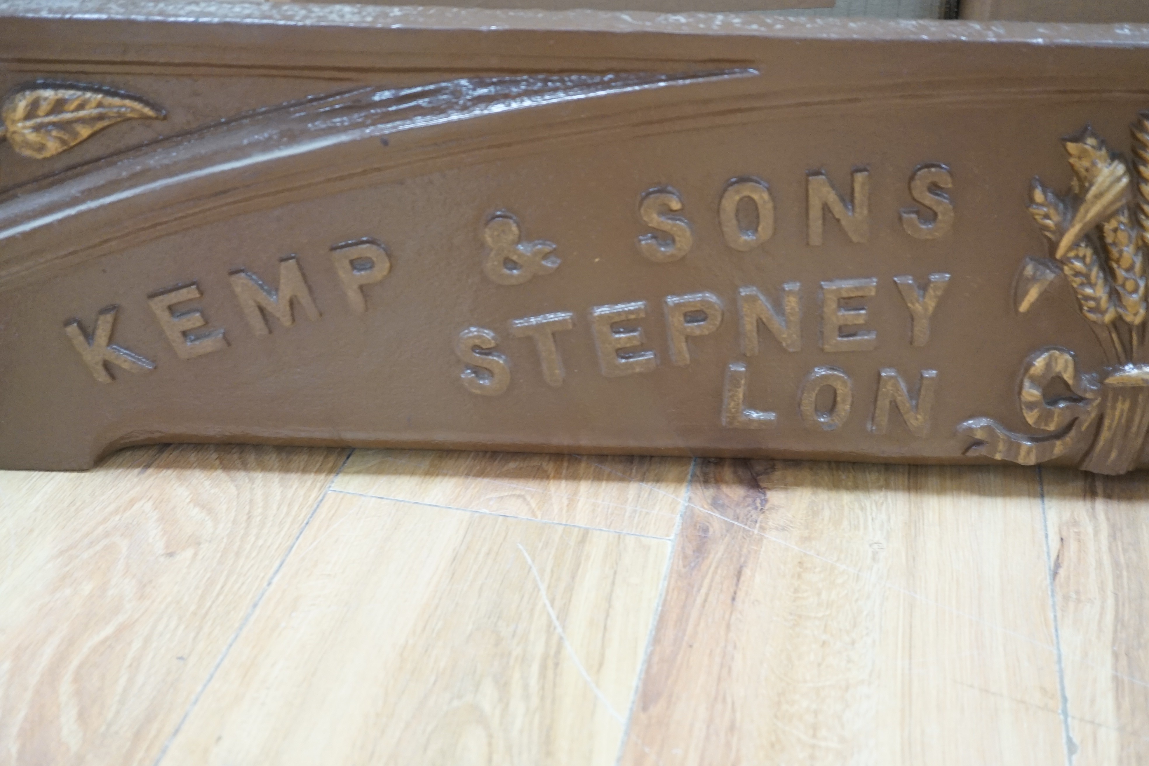 A Kemp & sons, oven builders, Stepney Green, London, cast iron advertising standing panel, 118 cms wide